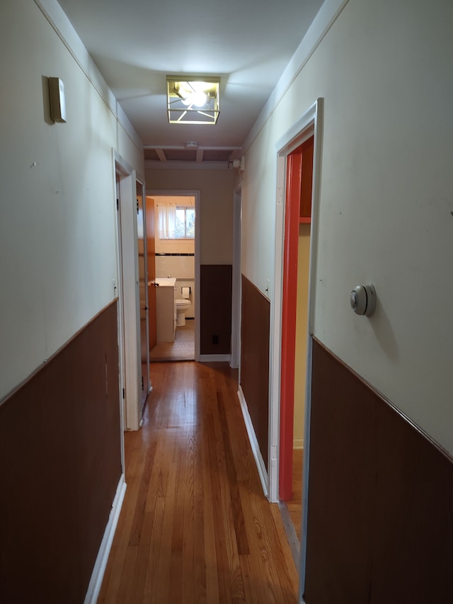 hallway with light wood-type flooring