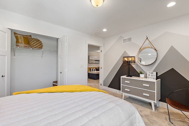 carpeted bedroom featuring a closet