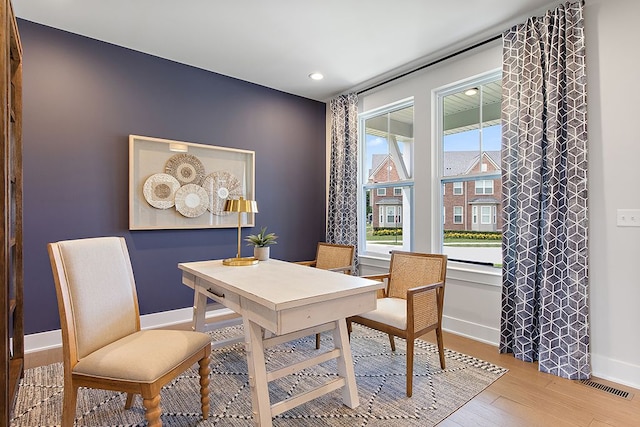 dining room featuring light hardwood / wood-style floors