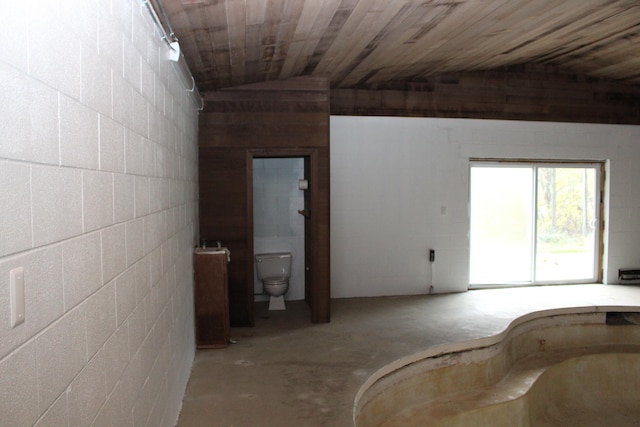 interior space featuring vaulted ceiling