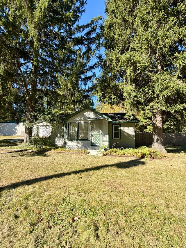 exterior space featuring a front lawn