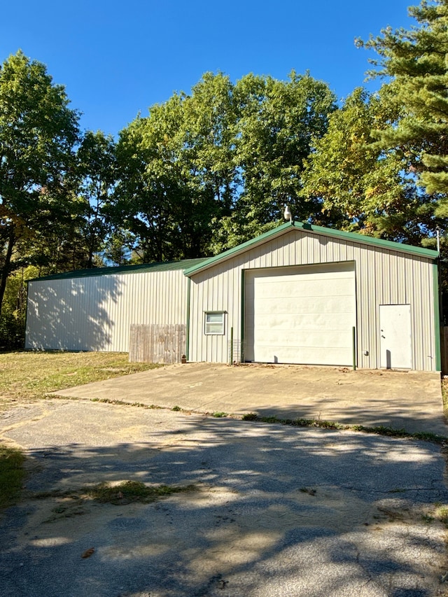 view of outbuilding with a garage