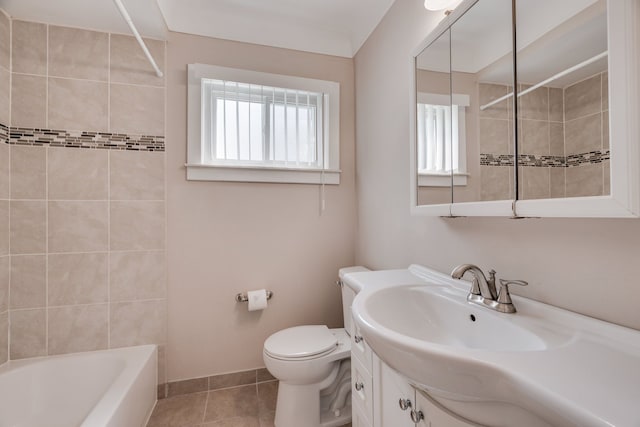 full bathroom with tile patterned flooring, vanity, toilet, and tiled shower / bath combo