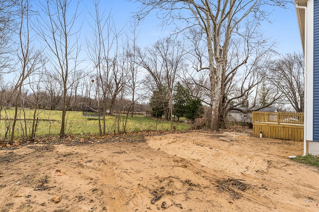 view of yard featuring a deck