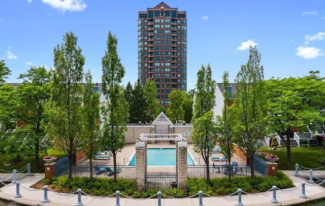 view of swimming pool with a patio area