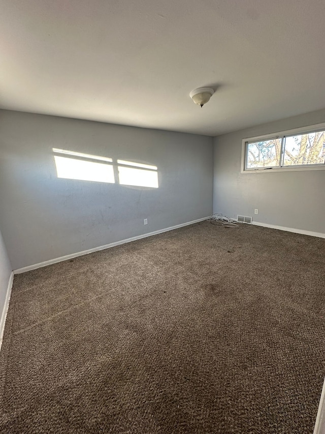 view of carpeted spare room