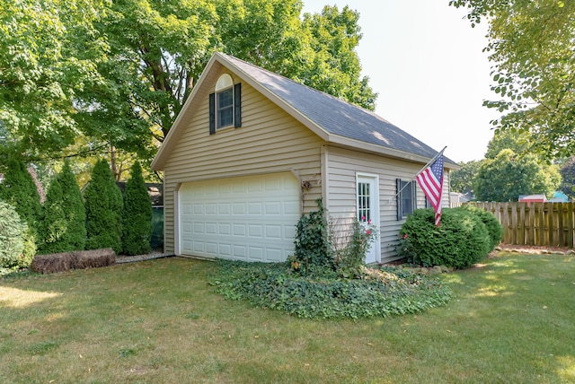 garage with a yard