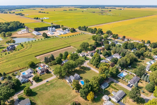 aerial view featuring a rural view and a water view