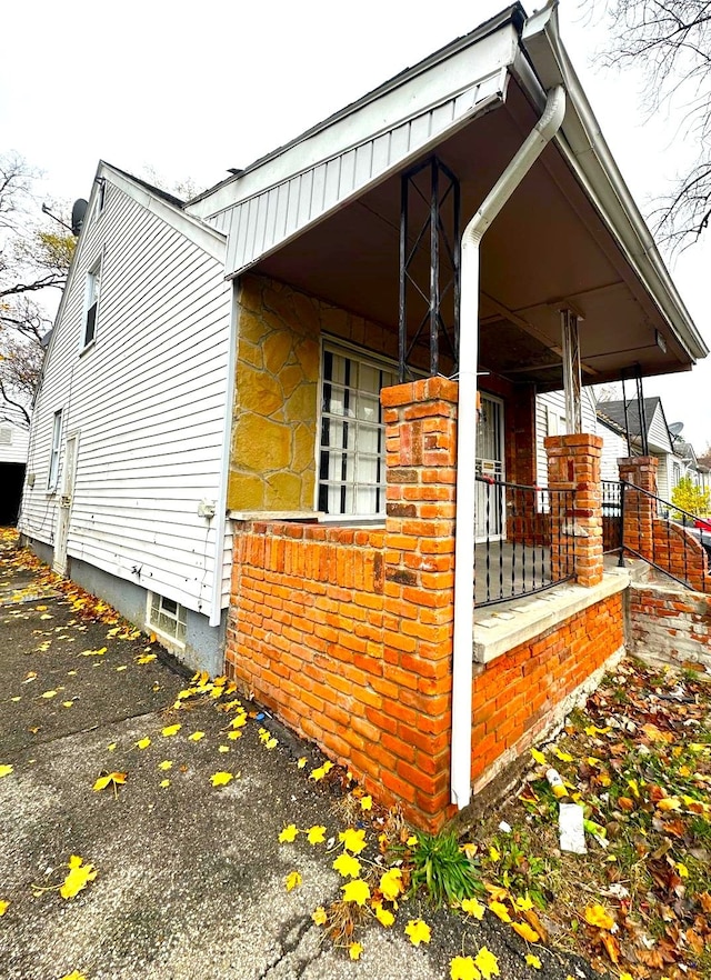 view of home's exterior featuring a porch