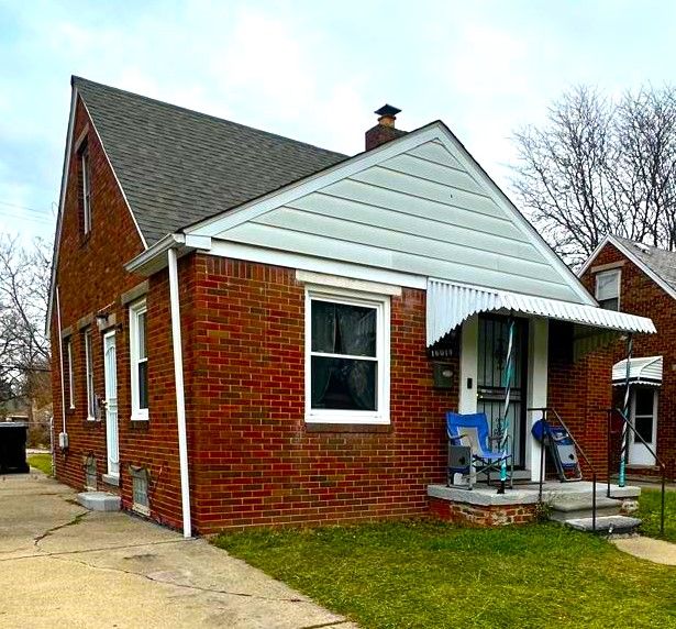 exterior space with a front lawn