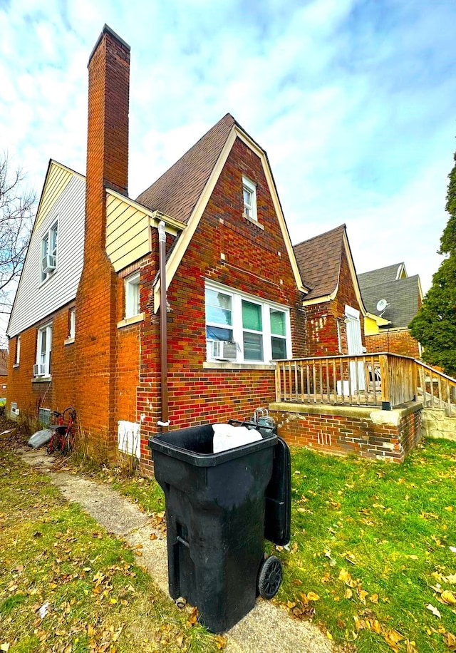 rear view of house with a lawn