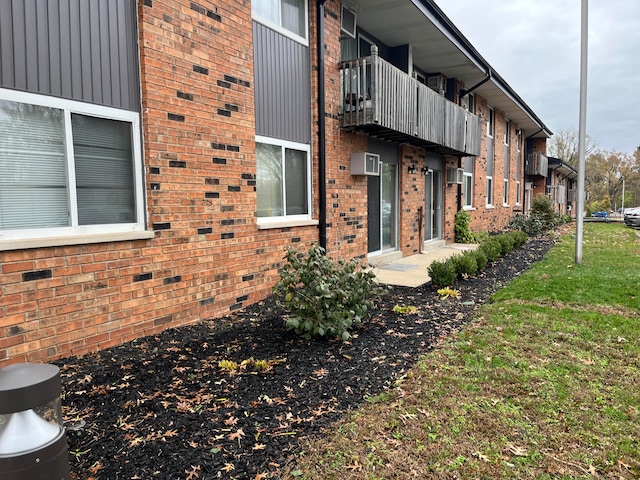 view of home's exterior with a lawn