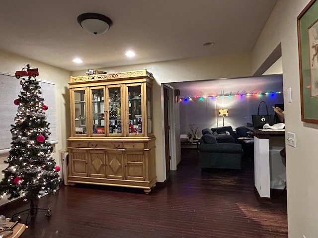 hallway featuring dark hardwood / wood-style floors