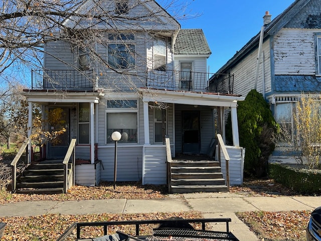2932 Elmwood St, Detroit, MI 48207 - view of front of house with a balcony and covered porch