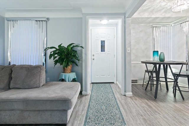 entrance foyer with hardwood / wood-style floors