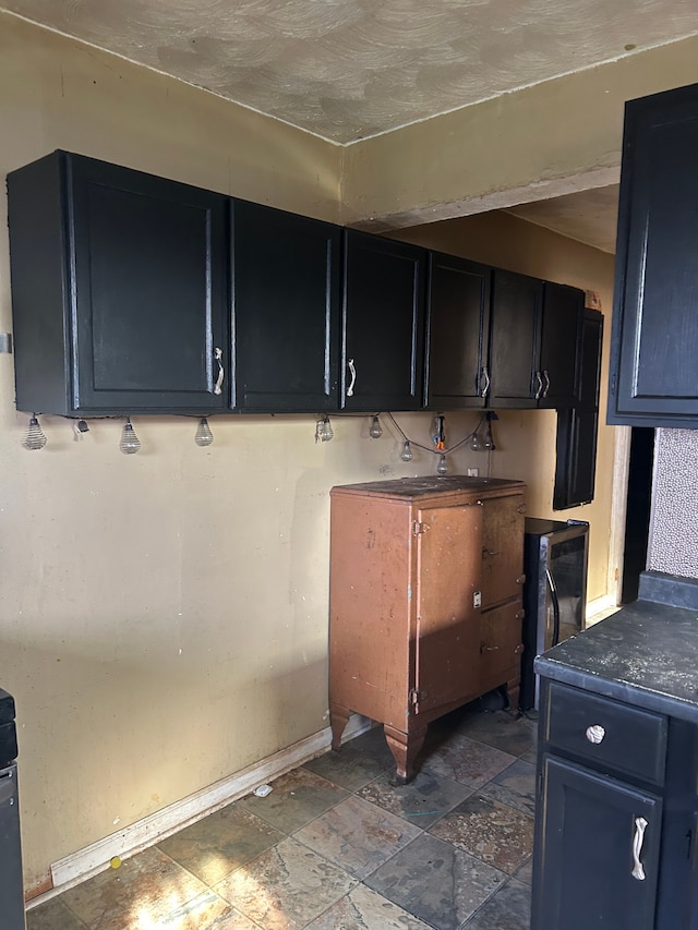 kitchen featuring blue cabinets