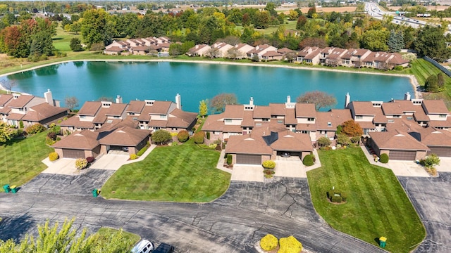 drone / aerial view featuring a water view