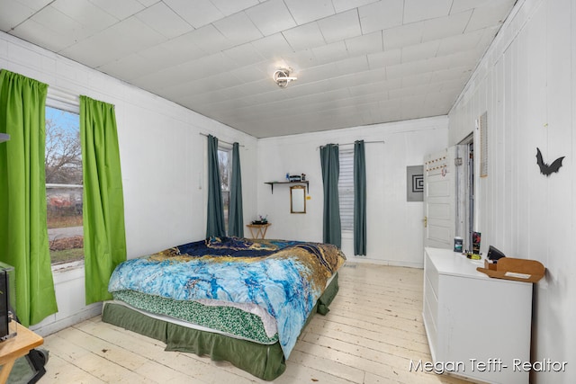 bedroom with light wood-type flooring