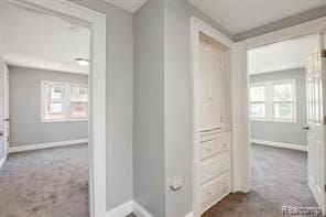 5200 Haverhill St, Detroit, MI 48224 - hall with dark colored carpet and baseboards
