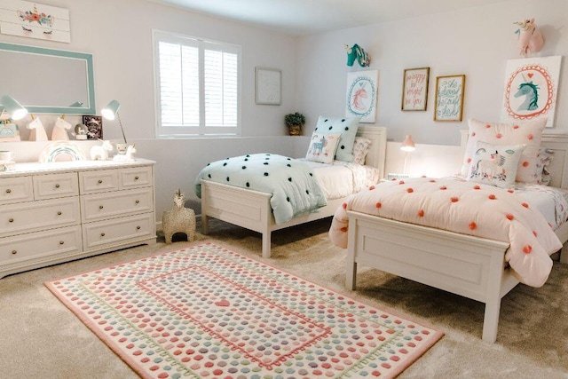 bedroom featuring light colored carpet