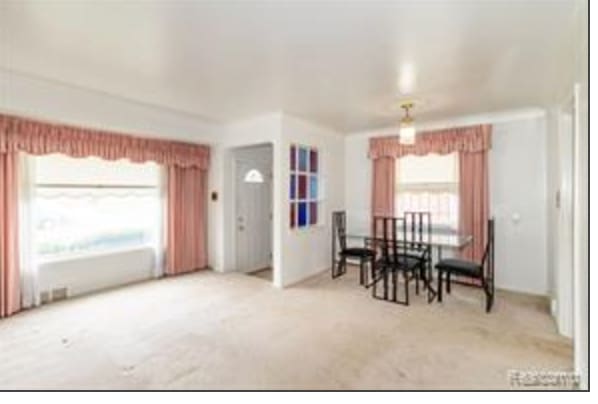 view of carpeted dining room