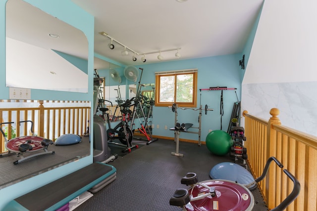 exercise room with track lighting