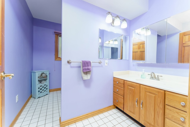 bathroom featuring tile patterned floors and vanity