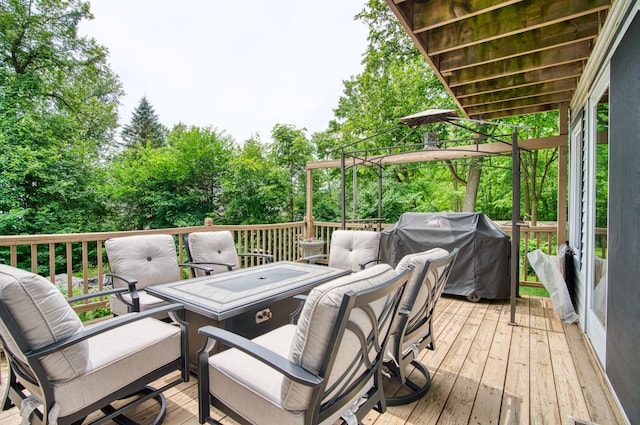 wooden deck featuring an outdoor hangout area and grilling area