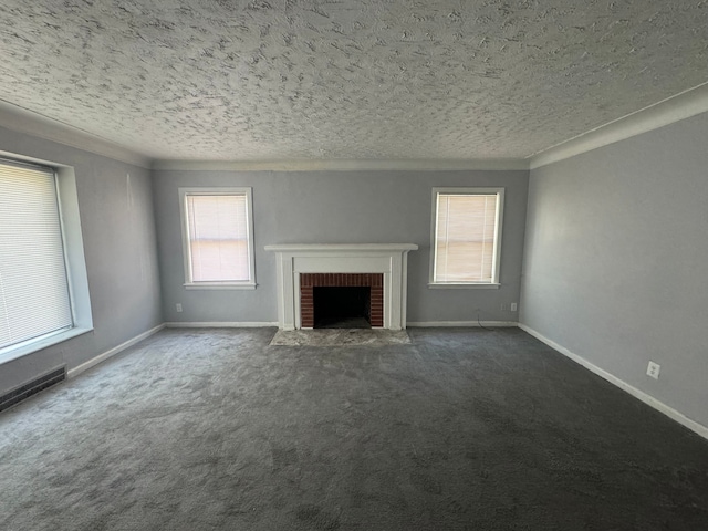 unfurnished living room featuring a fireplace, a textured ceiling, and dark colored carpet