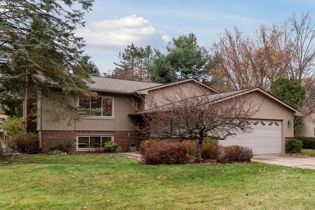 view of front of house with a garage and a front lawn