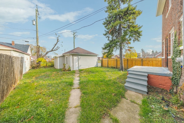 view of yard with an outdoor structure