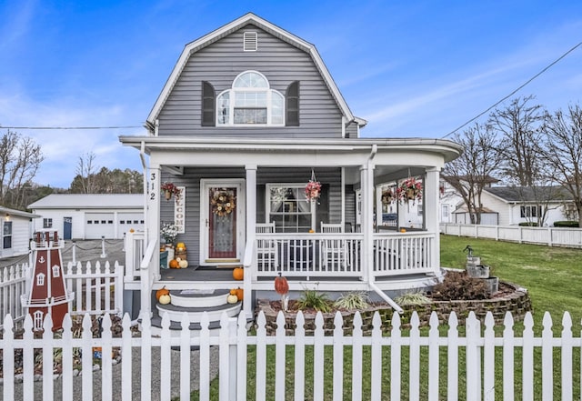 view of front of property featuring covered porch and a front lawn