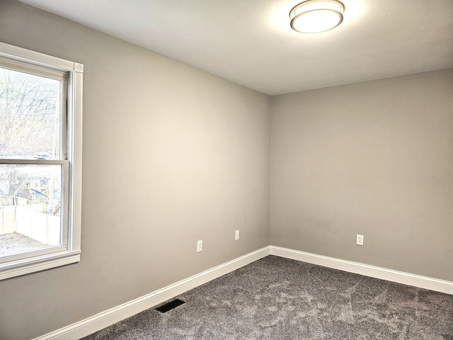 view of carpeted spare room