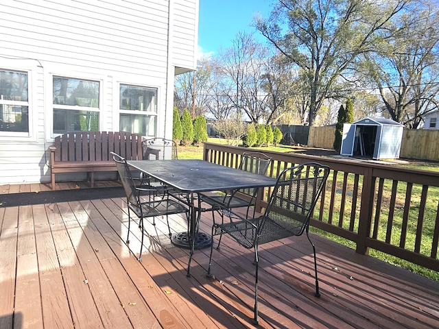 deck featuring a shed