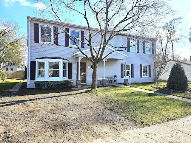 view of front facade with a front yard