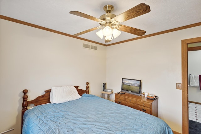 bedroom featuring ceiling fan and crown molding