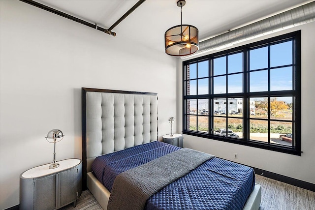 bedroom featuring hardwood / wood-style floors