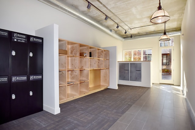 mudroom featuring mail boxes