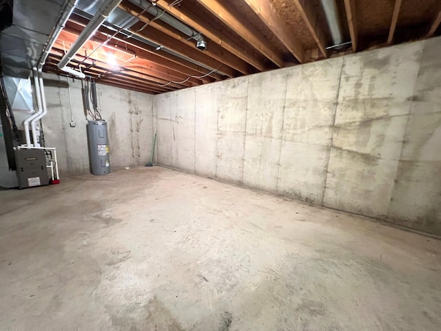 basement with heating unit and water heater