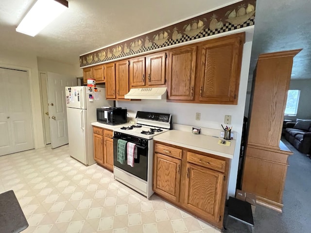 kitchen featuring white appliances