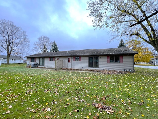 ranch-style house with a front yard