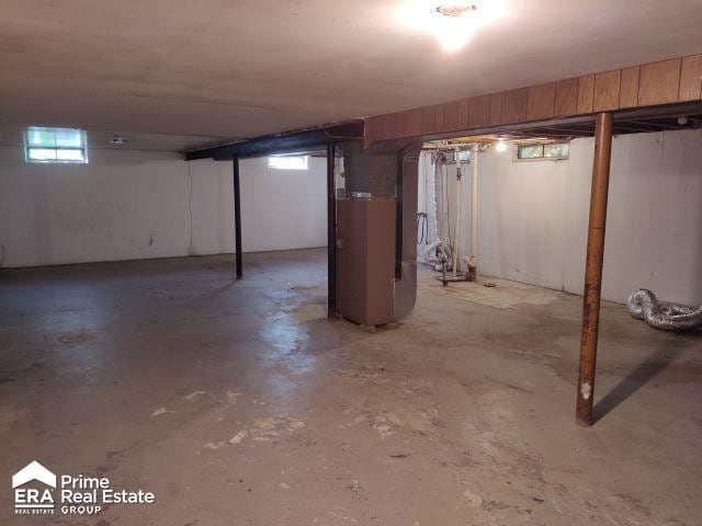 basement featuring heating unit