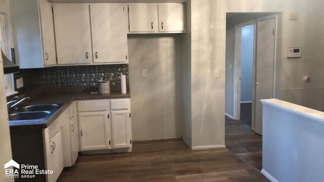 6223 Cypress Dr, Mount Morris, MI 48458 - kitchen with a sink, white cabinets, decorative backsplash, and dark wood-style flooring