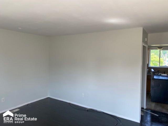 6203 Hilton Ln, Mount Morris, MI 48458 - unfurnished room with baseboards