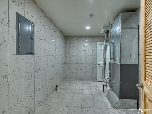 3495 Vermont Ct, Monroe, MI 48161 - full bathroom with electric panel, heating unit, a shower, and tile walls