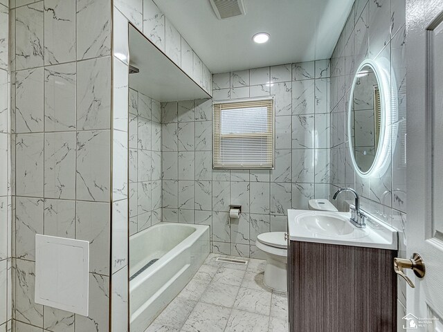 3495 Vermont Ct, Monroe, MI 48161 - bathroom featuring tile walls, toilet, and vanity