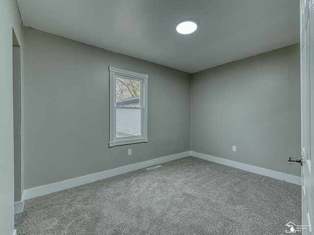 3495 Vermont Ct, Monroe, MI 48161 - empty room featuring carpet floors and baseboards