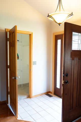 entrance foyer featuring light tile patterned flooring