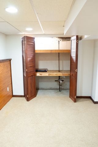 basement featuring built in desk