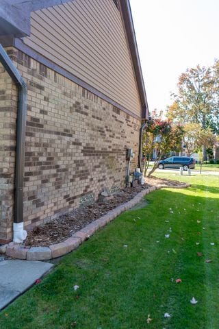 view of property exterior featuring a yard